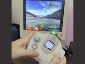 Une capture d'écran du kit BitLink DC de 8BitMods pour la Sega Dreamcast montrant les commandes de mouvement